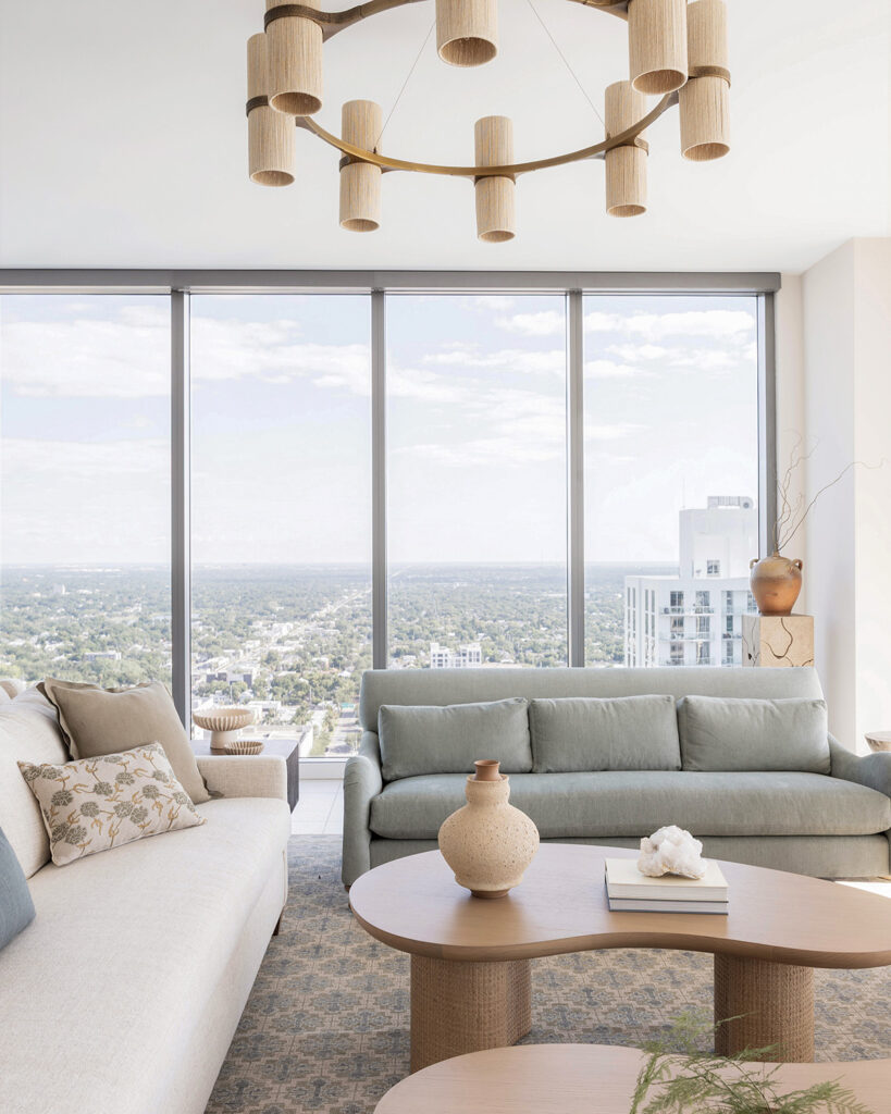 Full home furnishings by Astral House featuring a coastal, earthy color palette that is intentional and timeless to blend in with the Art House condo coastline.